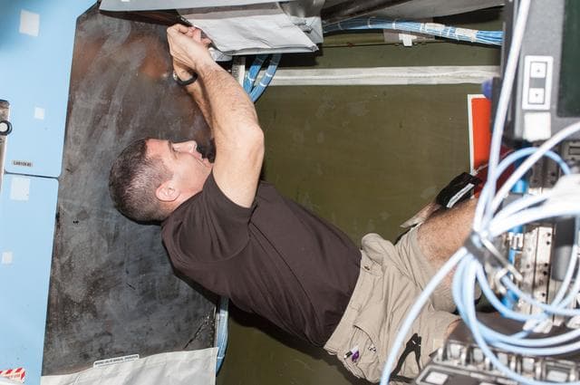 NASA image: Common Cabin Air Assembly (CCAA) Water Separator R&R