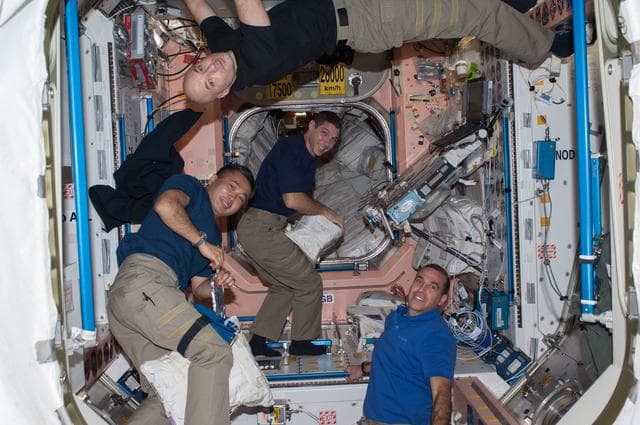 NASA image: Crewmembers moving into Node 1 module