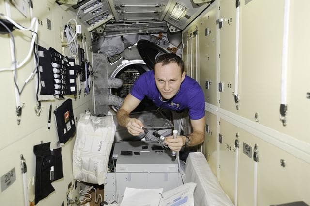 NASA image: Matryoshka R -  Ryazanskiy during activity with Bubble Dosimeter Detector Kit A10