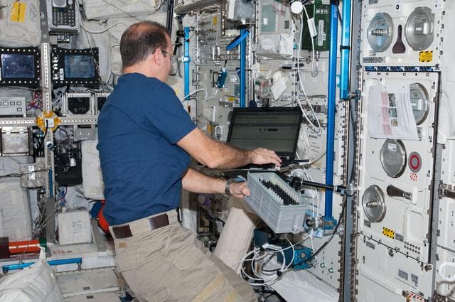 NASA image: Mastracchio assembles the Experiment Container in the Columbus Module