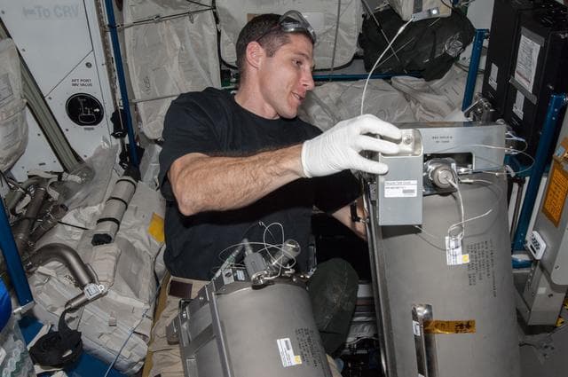 NASA image: Hopkins works with tanks from the ARFTA