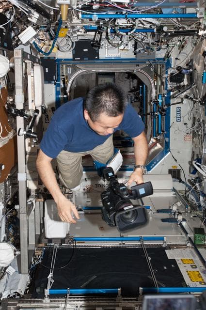 NASA image: Wakata works with video camera