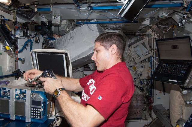 NASA image: Hopkins works with the Vaccine-21 GAP
