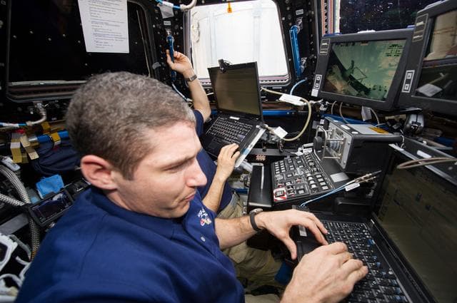NASA image: Hopkins and Wakata during Cygnus Spacecraft Unberthing