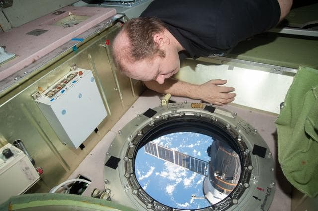 NASA image: Kotov looks out window in the SM