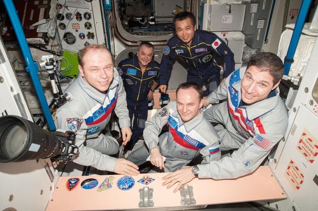 Expedition 38 Crewmembers in the Node 1