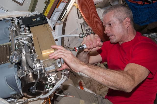 NASA image: Swanson during EMU FPS Remove and Replace OPS