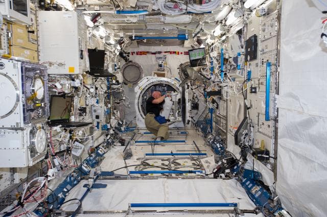NASA image: Gerst working on JEM airlock satellite deployer