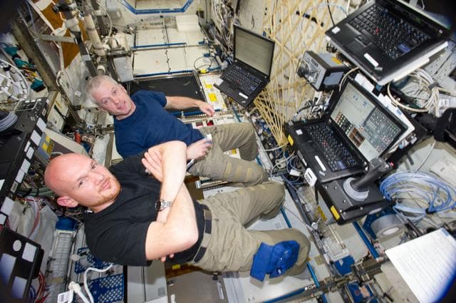 Swanson and Gerst during training session