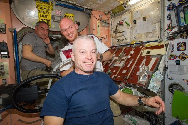 NASA image: Expedition 40 crew in Node 2 after German - U.S. soccer game