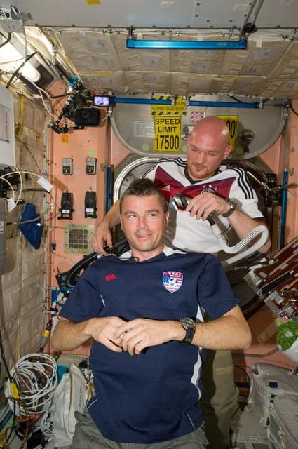 NASA image: Expedition 40 crew in Node 2 after German - U.S. soccer game