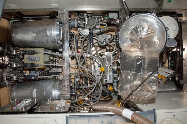 NASA image: Waste and Hygiene Compartment (WHC) Maintenance