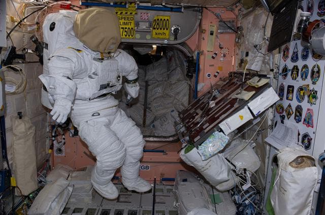 NASA image: EMU in Airlock