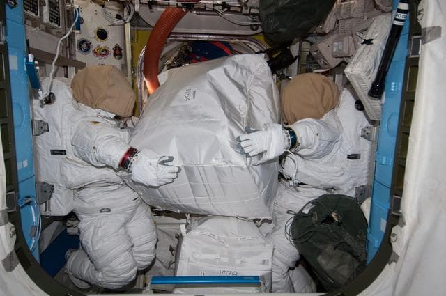NASA image: EMUs in Quest airlock