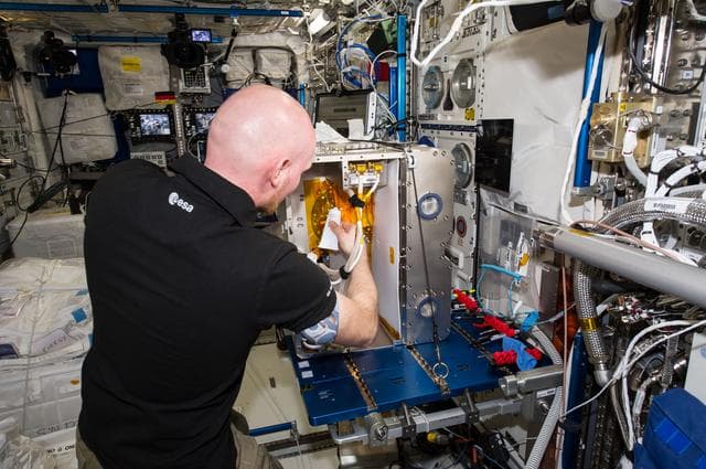 NASA image: Gerst works with the EML hardware in the Columbus Module