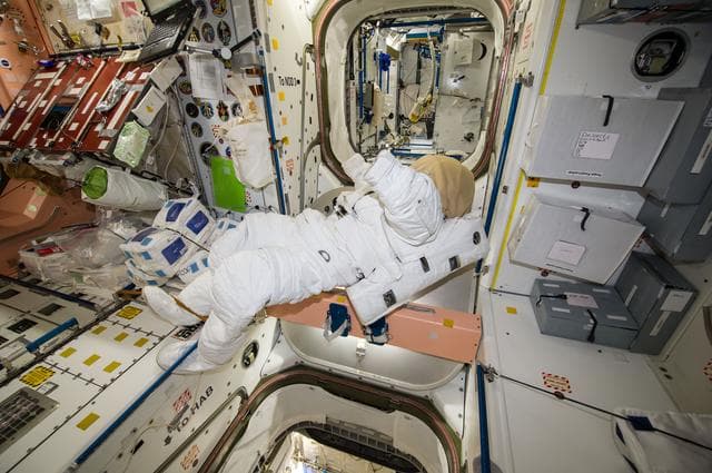 NASA image: EMU floating in the Node 1
