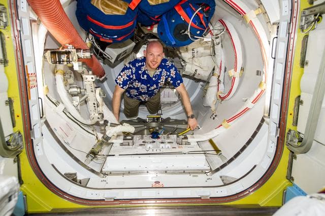 Gerst in the Quest A/L during EVA Preparation