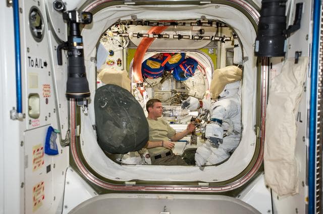 NASA image: Wiseman in the Quest A/L during EVA Preparation