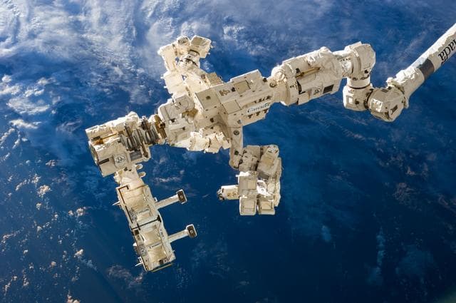 NASA image: SPDM DEXTRE carrying the Rapidsat Instrument Assembly