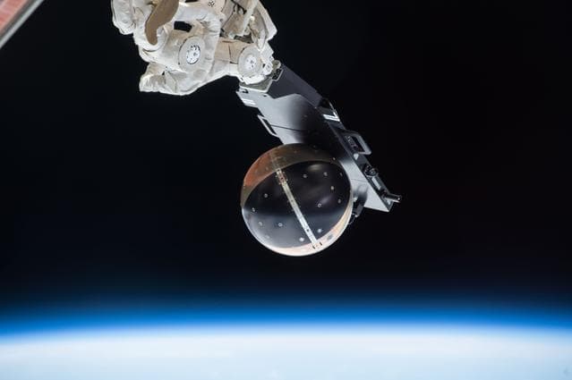 NASA image: SpinSat deployment from Cyclops Platform