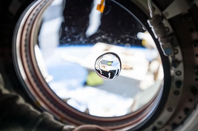 NASA image: Water bubble in front of JEM window