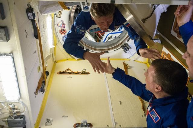 NASA image: 42S hatch opening sequence