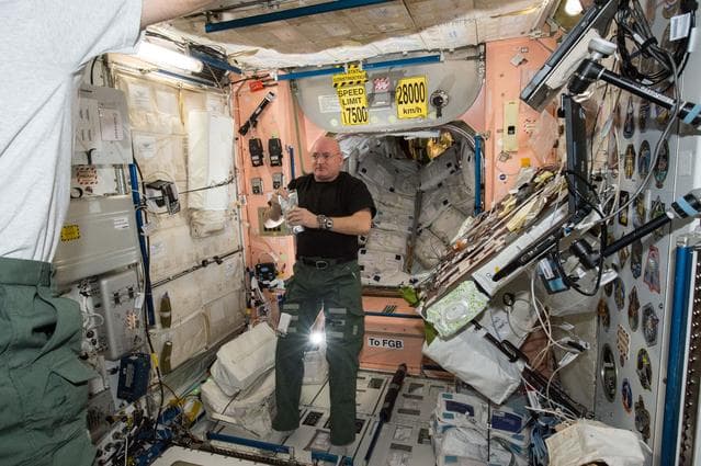 NASA image: Kelly in Node 1 for meal time