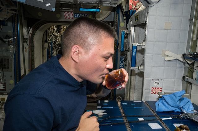 NASA image: Lindgren brews Coffee with Capillary Beverage Cup