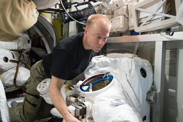 NASA image: Kopra during EMU Cooling Loop Maintenance
