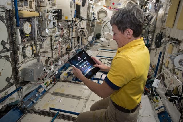 NASA image: Whitson using iPAD