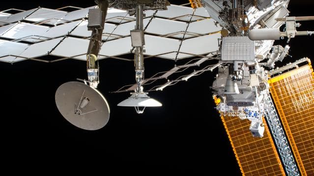 NASA image: AMS-02, radiator panel and solar array seen by EHDC1
