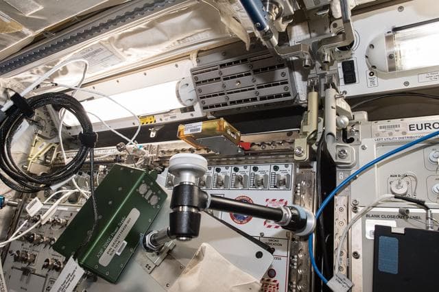 NASA image: Biolab Incubator Door Locking Bolt & Wico Motes Installation