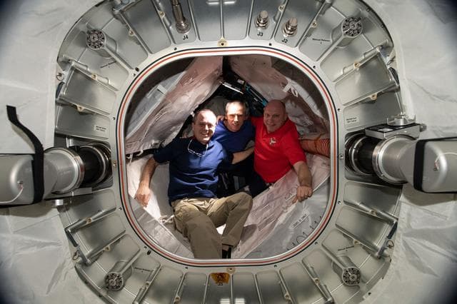 NASA image: Arnold, Feustel, and Artemyev in the BEAM during Daily Life on the ISS
