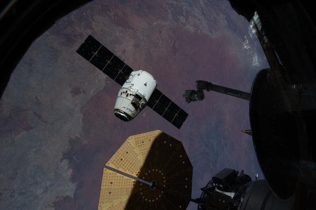 NASA image: The SpaceX Dragon cargo craft begins its departure from the International Space Station