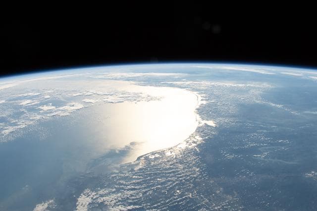 NASA image: The Sun's glint reflects off the Gulf of Mexico