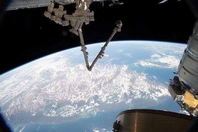 NASA image: The International Space Station's Canadarm2 robotic arm and Dextre robotic hand