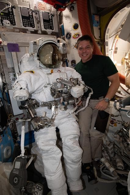NASA image: Behnken posing with EMU