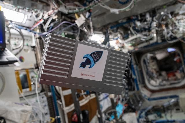 NASA image: TangoLab Card Cube Removal