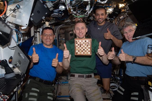NASA image: Expedition 69 Flight Engineers play chess with NASA mission controllers