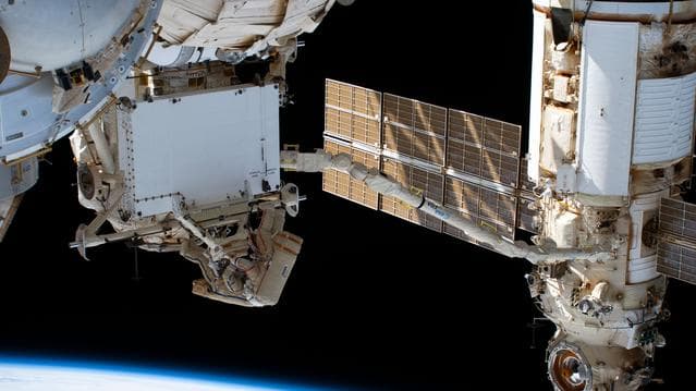 NASA image: Roscosmos spacewalkers remove a radiator on the Rassvet module