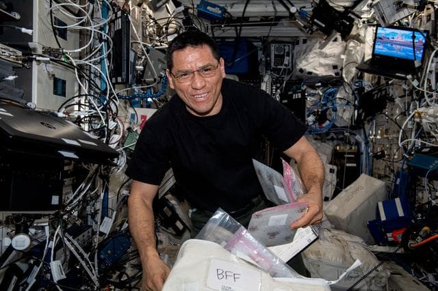 NASA image: Astronaut Frank Rubio works on a 3D bioprinter