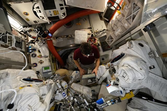 NASA image: EMU Cooling Loop Maintenance