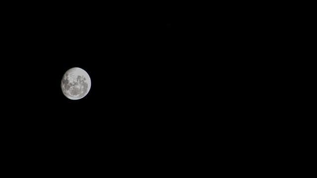 NASA image:  An illuminated waning gibbous moon