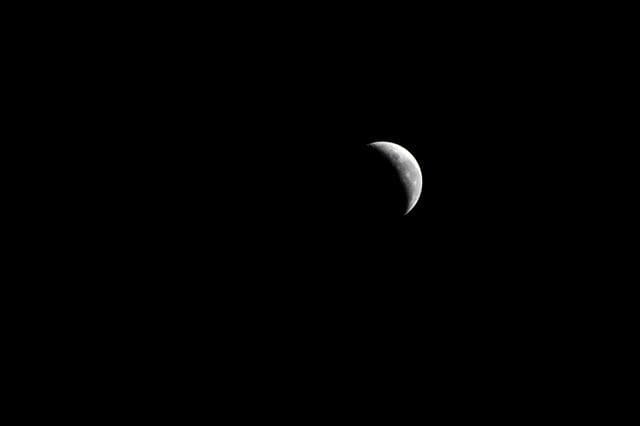 NASA image: A Waning Crescent Moon Above Italy