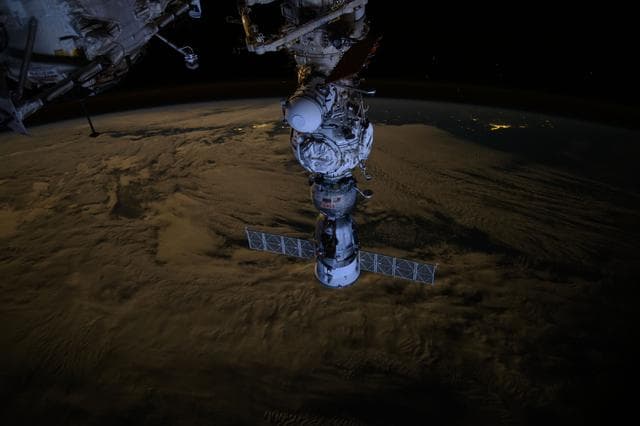 NASA image: The Soyuz MS-25 crew ship docked to the Prichal docking module