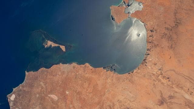 NASA image: The sun's glint beams off the Gulf of Gabes