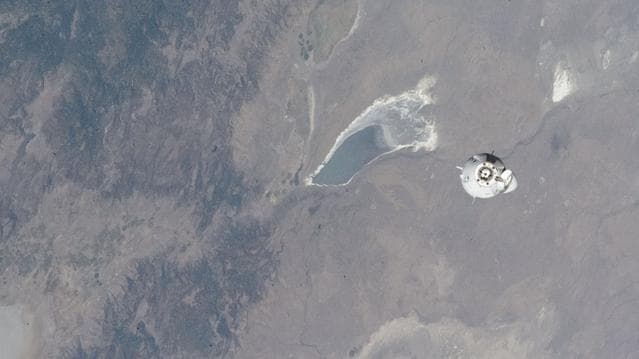 NASA image: The SpaceX Dragon Freedom approaches the station above Lake Abert in Oregon