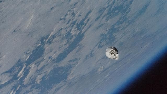 NASA image: The SpaceX Dragon Freedom approaches the station above Canada