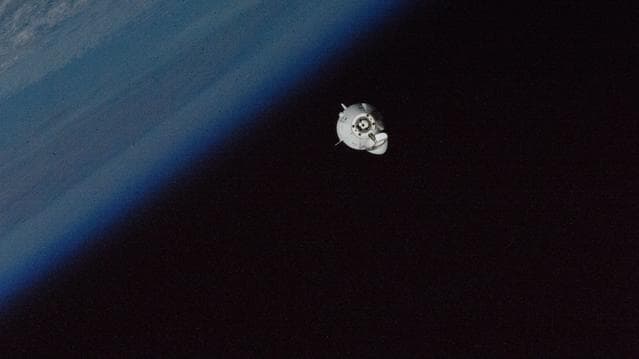 NASA image: The SpaceX Dragon Freedom approaches the station above Canada