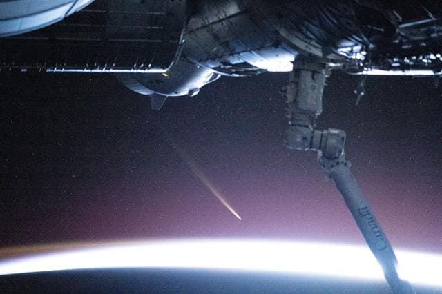 Comet C/2024 G3 (ATLAS) is pictured seemingly above Earth's atmosphere